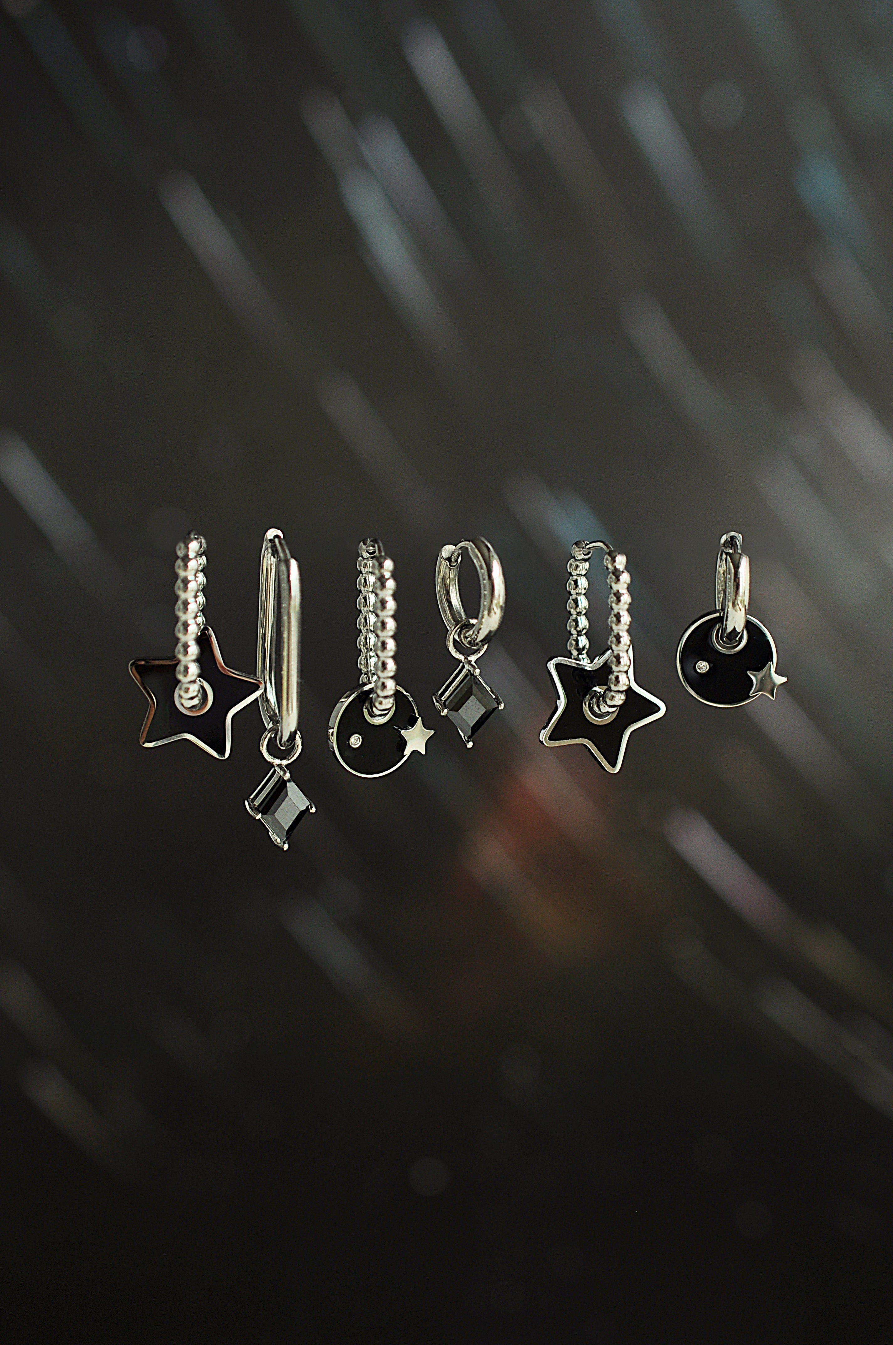 Ovale Creolen mit Tropfendesign „Black Star“ 