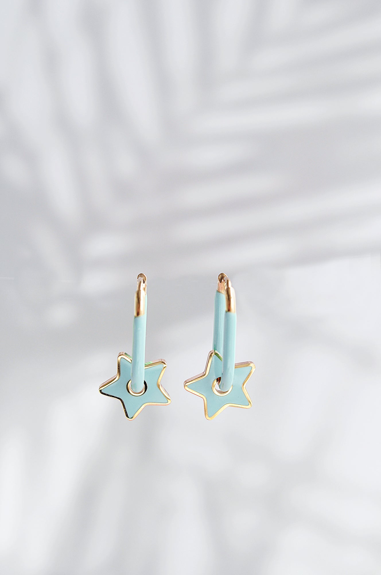 TURQUOISE STAR color oval hoops