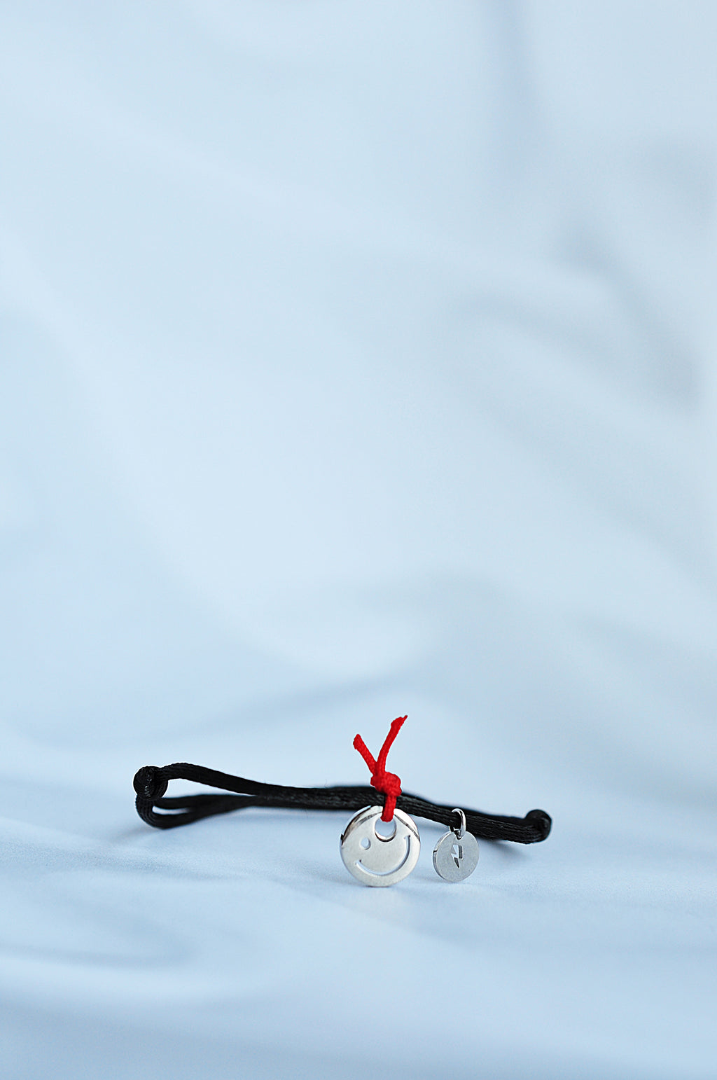 HAPPY string bracelet