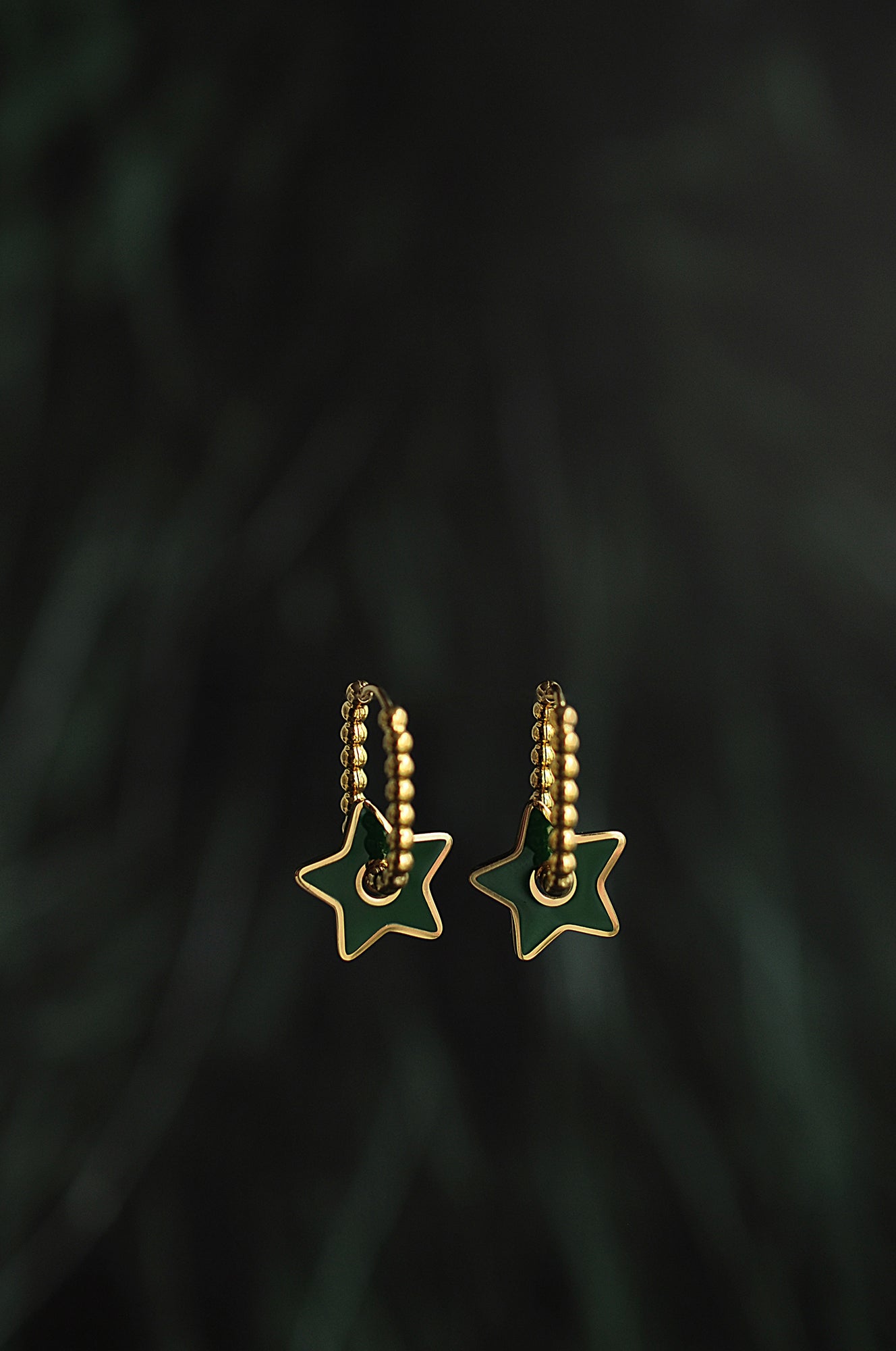 FOG FOREST Tropfenförmige ovale Creolen 