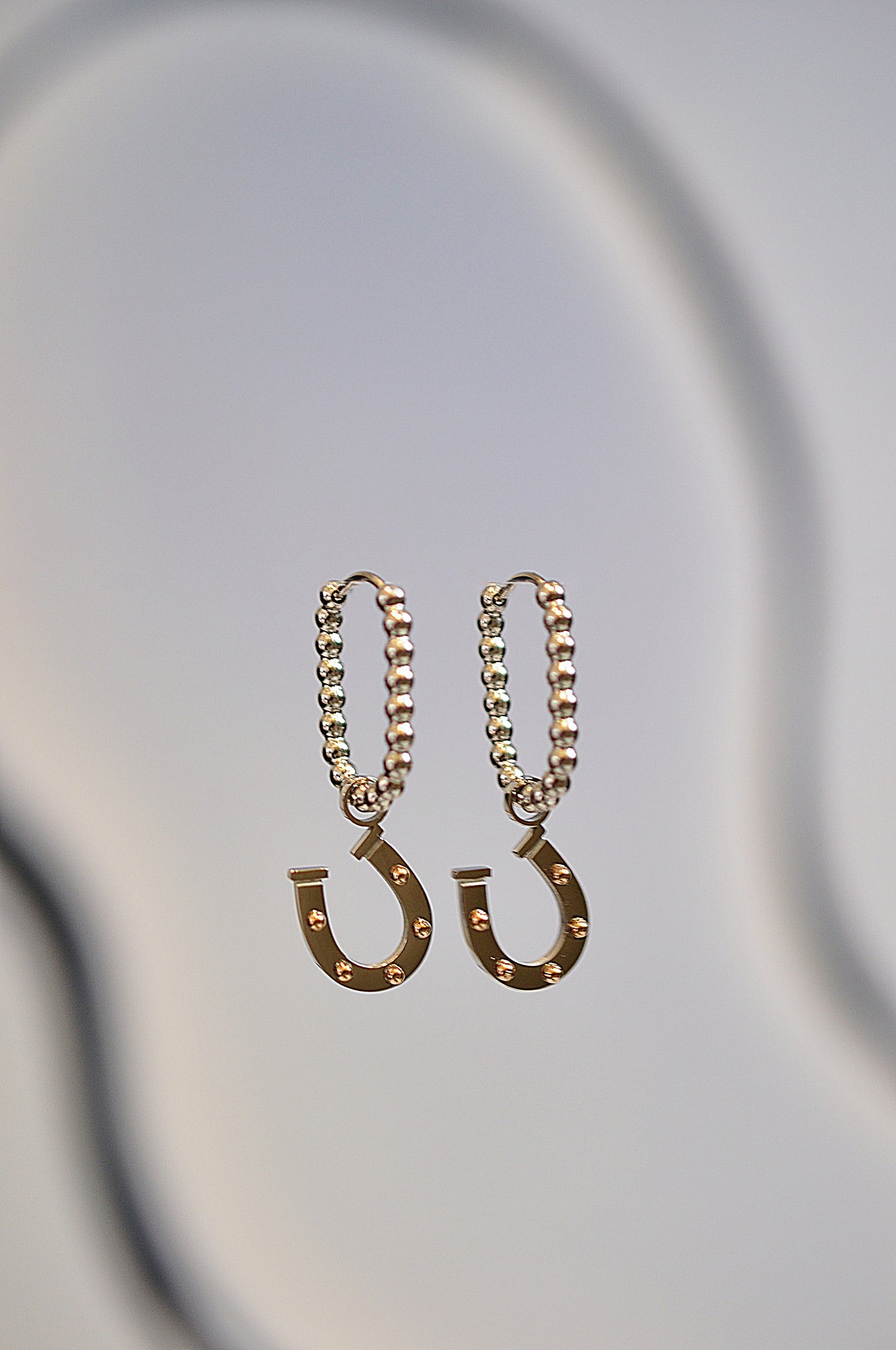 HORSE WHISPERER drop oval hoops